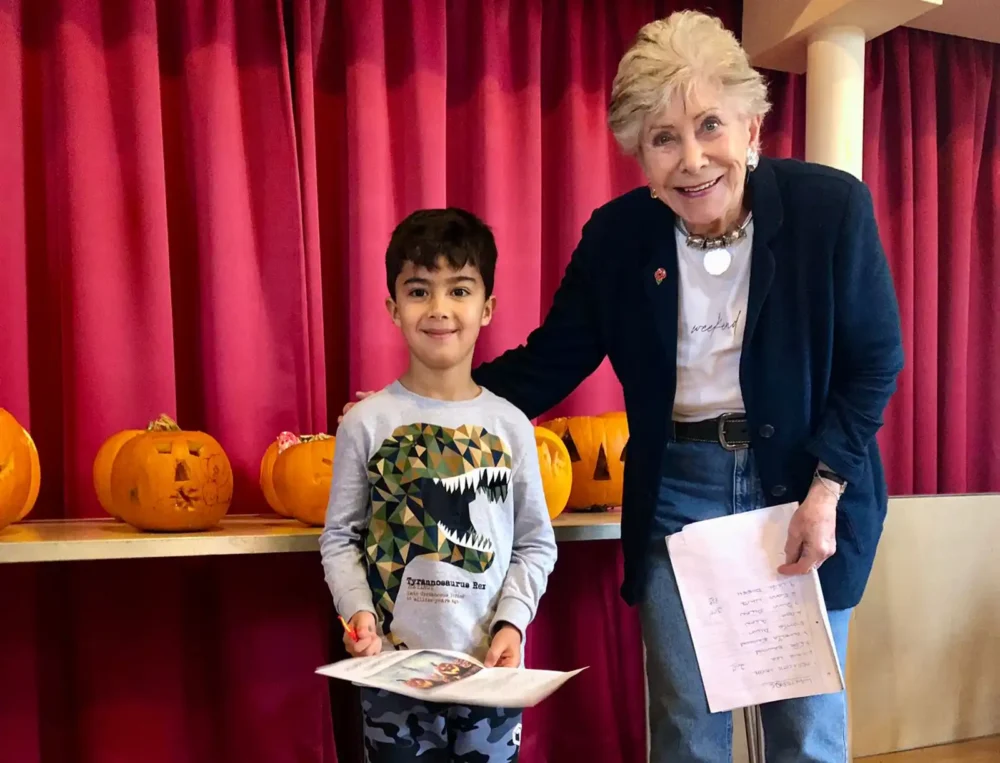 Valerie Singleton with Fionn de Trey-White, who came third in pumpkin competition