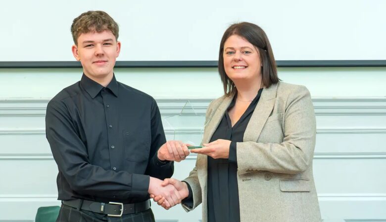 Apprentice of the Year Mateusz Sapko receives his award. Picture: Blackmore Ltd