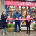 The ribbon being cut at Beaminster Post Office