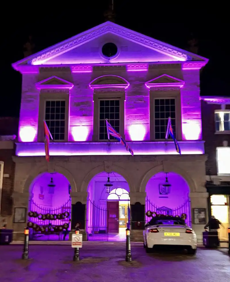 Blandford Forum Town Hall was lit in purple for World Pancreatic Cancer Day. Picture: Blandford Forum Town Council