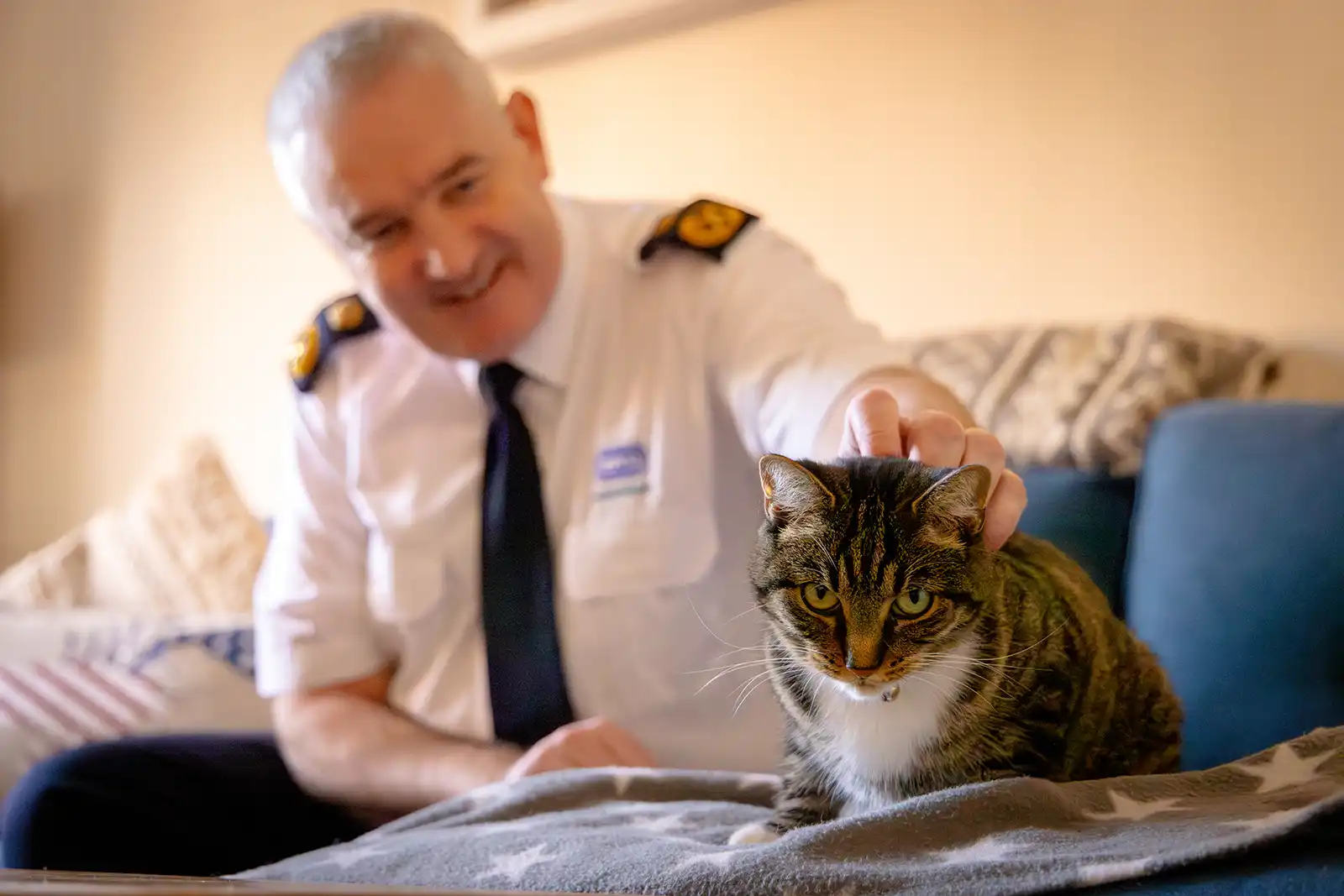 Dermot Murphy with a rescued cat. Picture: RSPCA