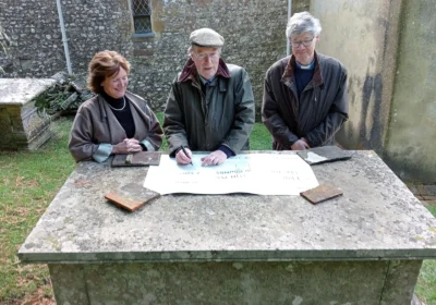 David Grant, chair of Dorset Historic Churches Trust, wth Rev Tim Greenslade and churchwarden Sophie Stovin