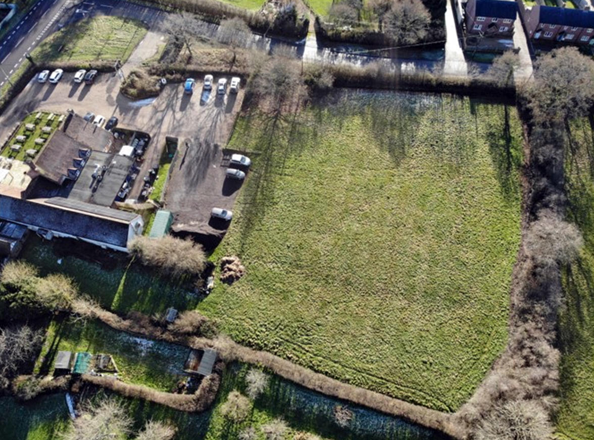 The plots would be created on land behind the Green Man. Picture: ADH Designs/Dorset Council