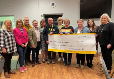 Members of the Wickfest organising committee recently presented a cheque for £4,500 to Dorset and Somerset Air Ambulance