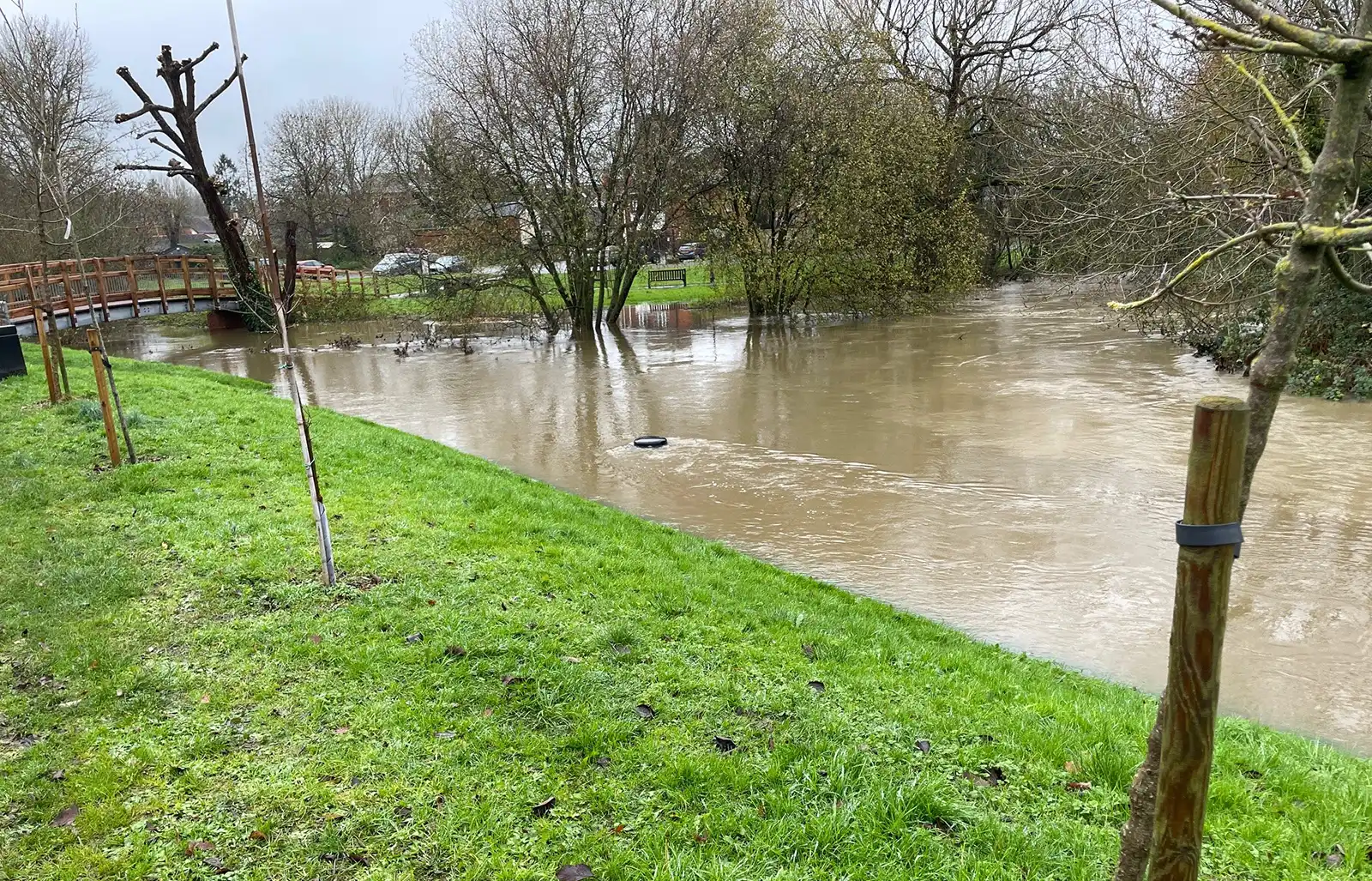 A dog bin submerged under flood water in Gillingham. Picture: Kajetan Boczanowski