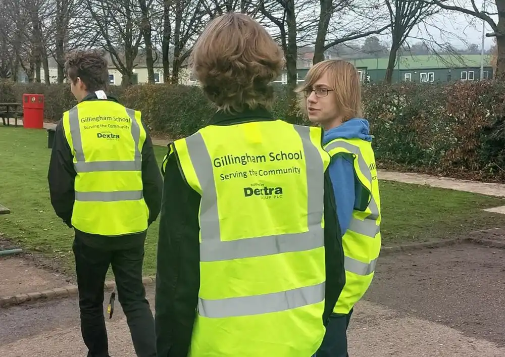 Sixth formers in the hi-vis jackets provided by Dextra Group
