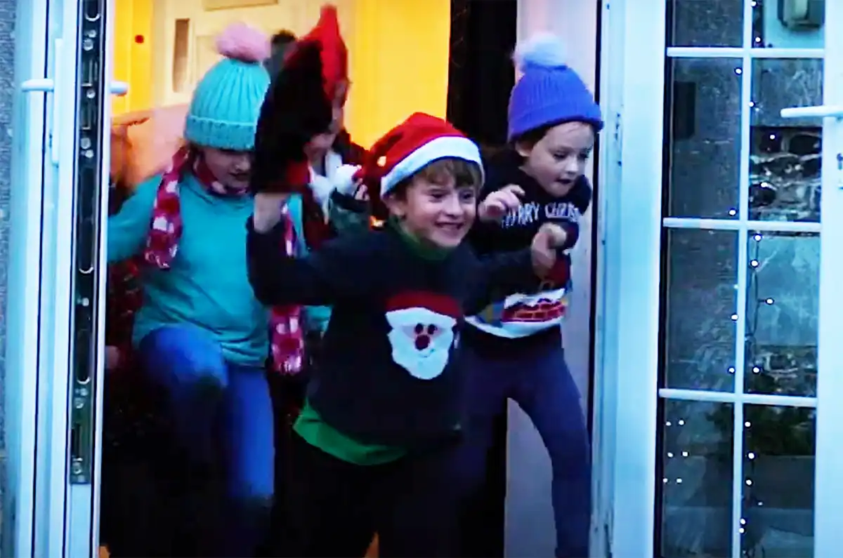 Children and drone lighting feature in the campaign video