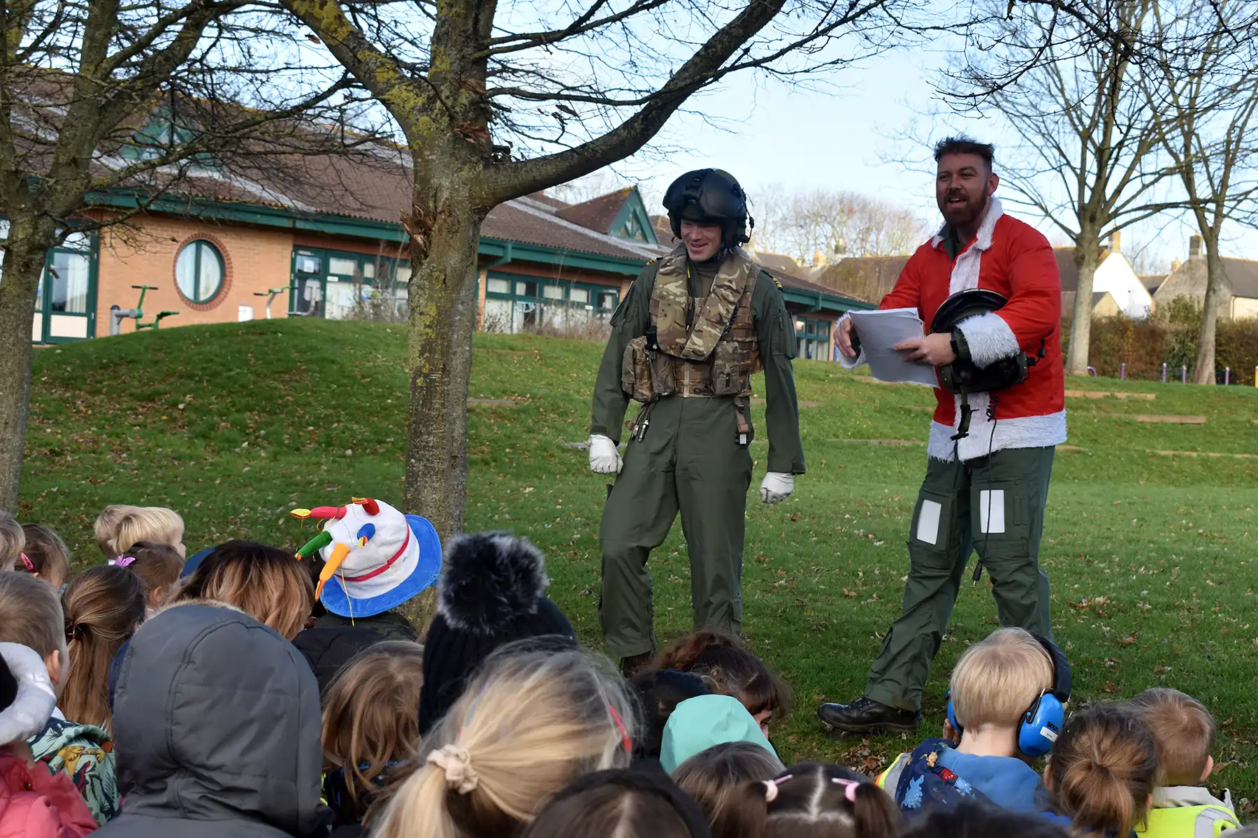 Pilots Lt Cdr William Thornton and Lt Cdr David Lilly chatted with children at Sherborne Primary School