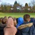 The helicopter lands on the playing field at Sherborne Primary School