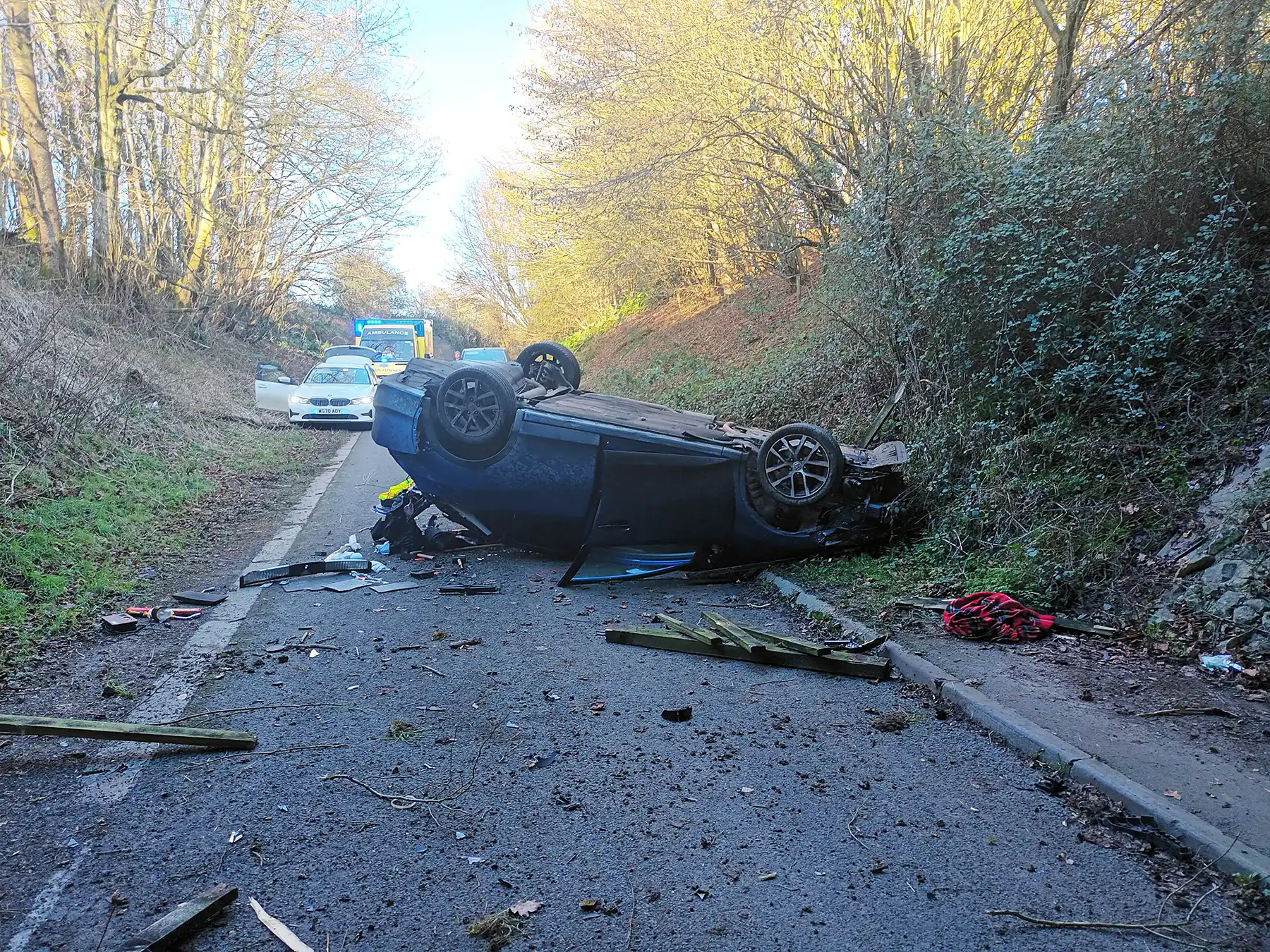 The car came to rest on the road below the A303 after crashing off at bridge near Wolverton. Picture: Philip Schofield