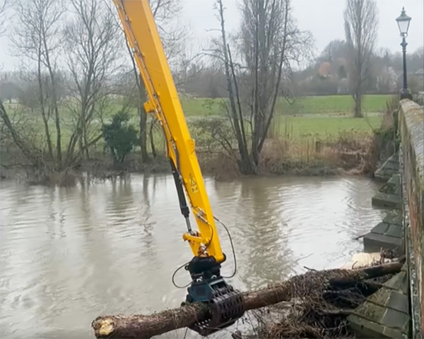 The fallen tree was trapped on the arches of Blandford Bridge. Picture: Dorset Council