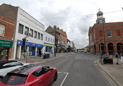 The pedestrian was hit by a car in West Street, Bridport, near the junction with South Street. Picture: Google