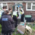 Officers at the address in Blandford on Tuesday. Picture: Dorset Police