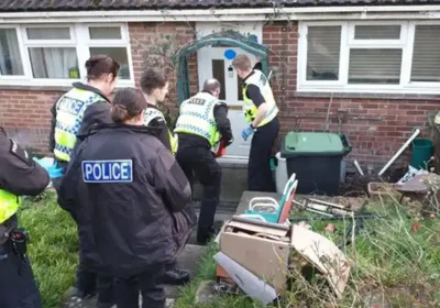 Officers at the address in Blandford on Tuesday. Picture: Dorset Police