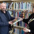 Damian Cranny with Hannah Roberts at Poole Library. Picture: Dorset Police