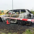 The BMW is left burned out on the roundabout near McDonald's in Wincanton. Picture: New Blackmore Vale