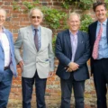 David Pritchard, second left, with former headteachers Peter Dix, left, and Stephen Ilett, second right, and current head Titus Mills, at Port Regis in 2022