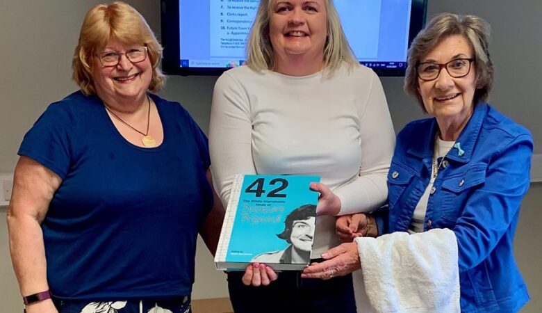 Sue Adams, chairman of Stalbridge Town Council Katie Garland and cllr Pauline Batstone from Sturminster Newton Town Council - complete with hitchhiker’s towel Picture: Pauline Batstone