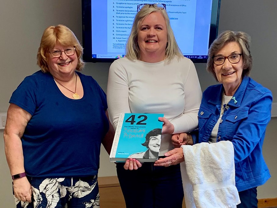 Sue Adams, chairman of Stalbridge Town Council Katie Garland and cllr Pauline Batstone from Sturminster Newton Town Council - complete with hitchhiker’s towel Picture: Pauline Batstone