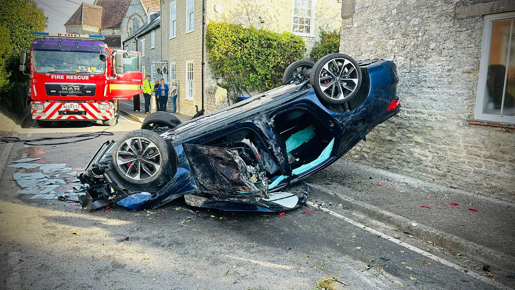 The Audi was left on its roof after a crash in Mere this morning. Picture: Wiltshire Police