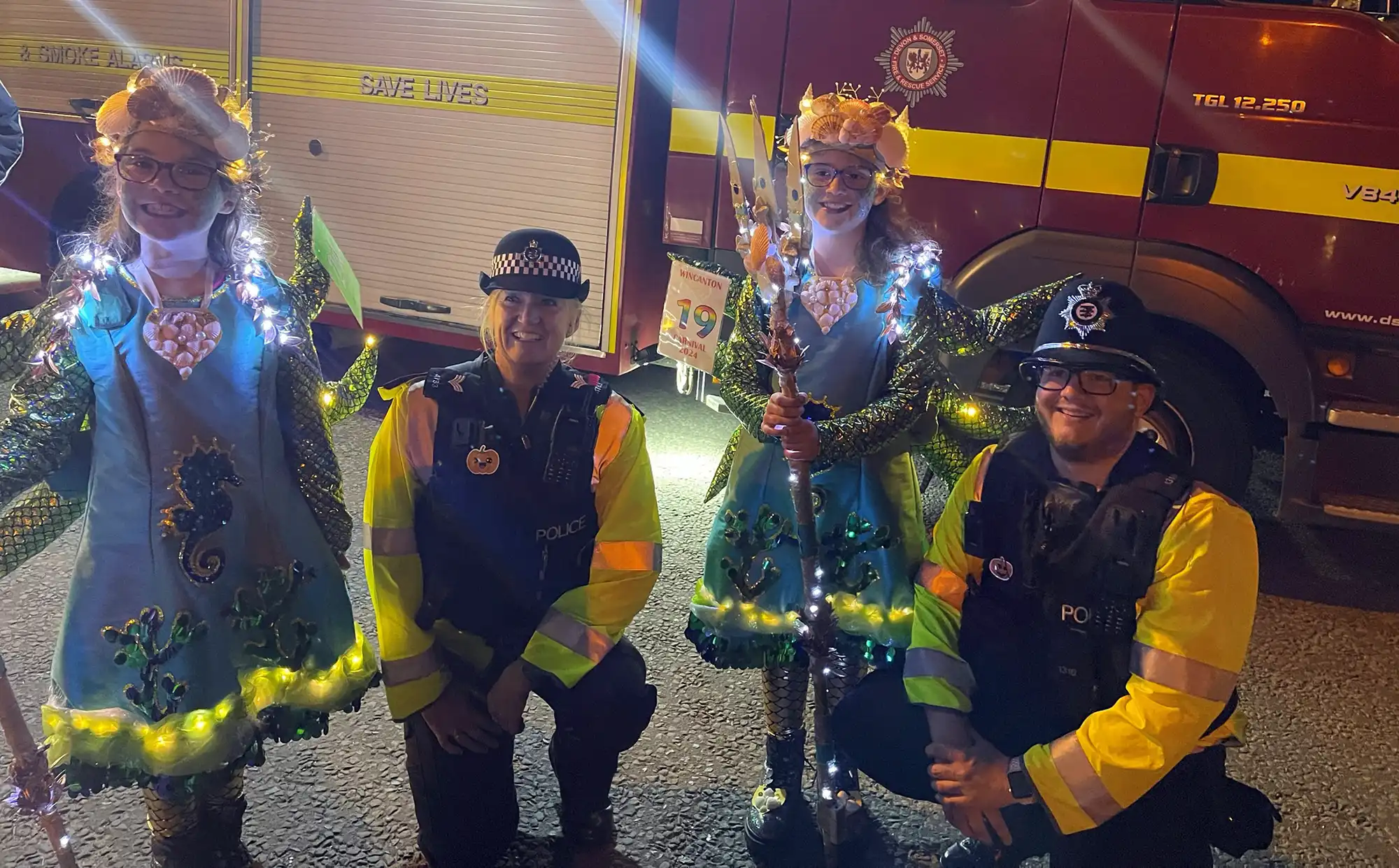 Officers from the Mendip Neighbourhood Police team pose with youngsters