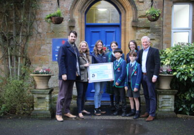 Students and staff at Sherborne Prep School handing the cheque to Dorset Wildlife Trust Picture: Dorset Wildlife Trust