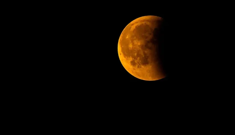 A 'blood moon' might be visible on Friday morning, weather permitting