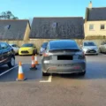 The surgery posted a picture of parking by a Tesla driver on the Sherborne site