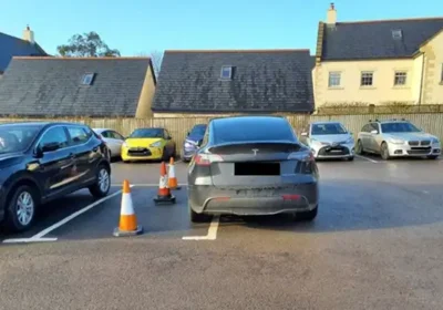 The surgery posted a picture of parking by a Tesla driver on the Sherborne site