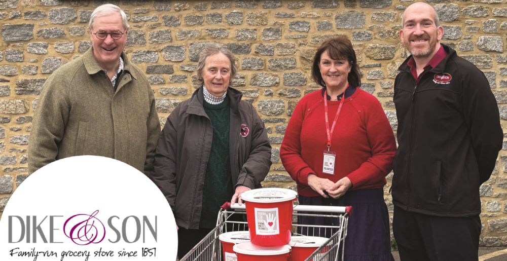 Dike’s director Adam Vincent (right) and Sherborne Food Bank communications volunteer Liz Murray (centre), with customers Mark and Tessa Woodhouse, who contributed a large amount of points to help take the total to more than £650 Picture: Dike & Son