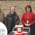 Dike’s director Adam Vincent (right) and Sherborne Food Bank communications volunteer Liz Murray (centre), with customers Mark and Tessa Woodhouse, who contributed a large amount of points to help take the total to more than £650 Picture: Dike & Son