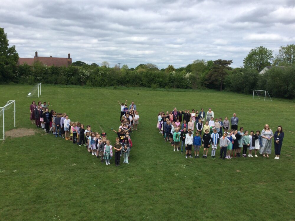 The pupils forming a giant VE Picture: St Andrew's Primary