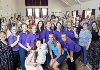 Members of the Cygnet Homebirth Team with families at the celebration