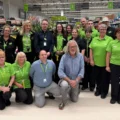 Former Top Gear host James May with staff at Asda in Gillingham. Picture: Asda
