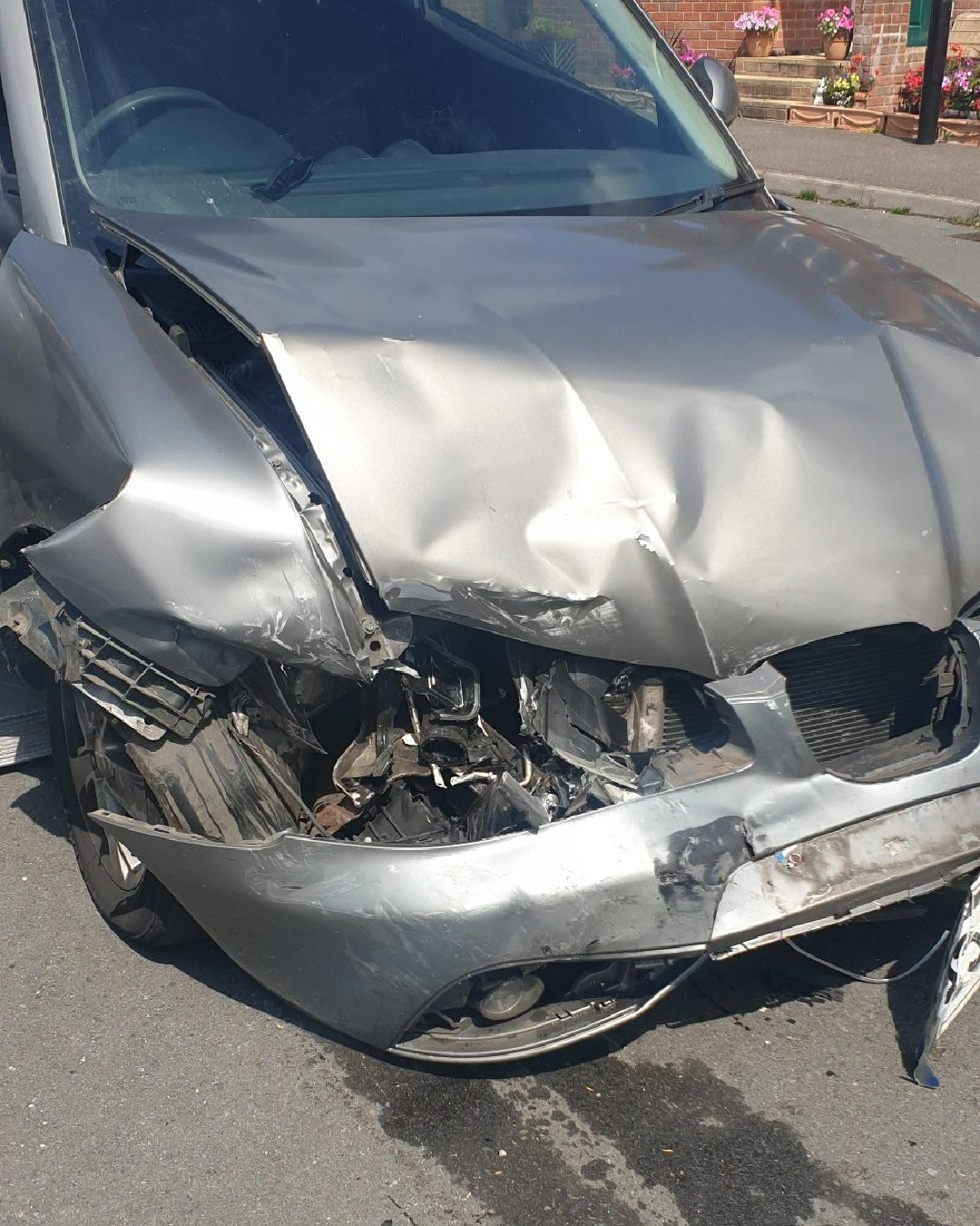 A car was badly damaged in the crash, in Shaftesbury, on Tuesday. Pictures: Dorset Police