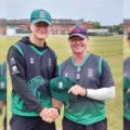 Paul Lawrence, Head Coach of Dorset’s Men’s First team, handing Alfie his cap Picture: Bryanston School