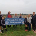 PYFC co-founder Andy Jeffery, player Logan, Ben Benatto, Malcolm Andrews and Jason Chinn, player Elsie, Emily Vernon parent and coach Connor Rowlands Picture: PYFC