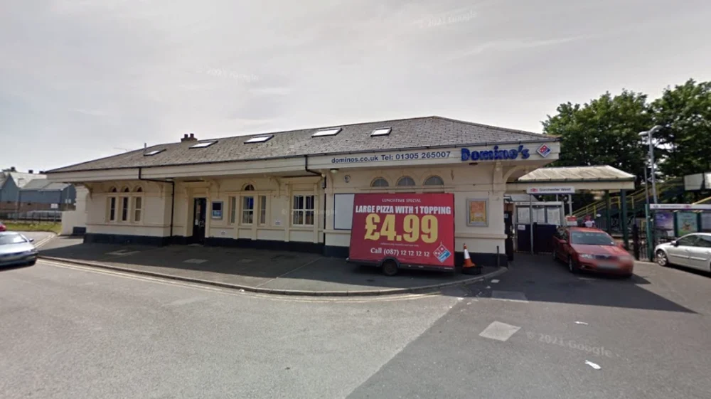 The alleged abuse occurred at Domino's Pizza at Dorchester Wesy station. Picture: Google