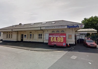 The alleged abuse occurred at Domino's Pizza at Dorchester Wesy station. Picture: Google