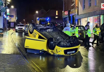 The car left on its roof after a crash in Gillingham High Street on Wednesday. Picture: New Blackmore Vale