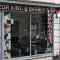Damage could be seen at Razor King Barbershop in Castle Street, Wincanton, on Monday morning. Picture: New Blackmore Vale