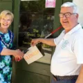 Mayor of Sherborne, Jill Warburton, and Antony Chambers, chairman of The Green Shed Sherborne, officially opening The Green Shed Sherborne at Castle Gardens