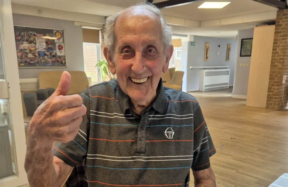 Gerald is excited ahead of his ride out in a motorcycle sidecar