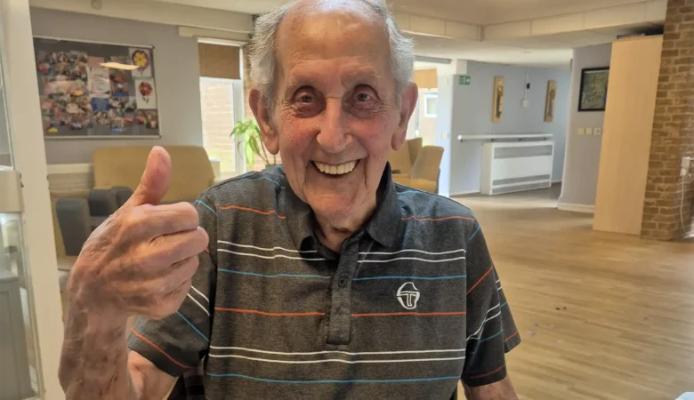 Gerald is excited ahead of his ride out in a motorcycle sidecar