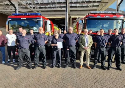 Michelle with friends and colleagures on her last day in Dorchester. Picture: Dorchester Fire Station