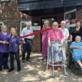 The mayor cut the ribbon to open the Castleman House Summer Fair