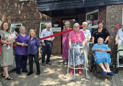 The mayor cut the ribbon to open the Castleman House Summer Fair