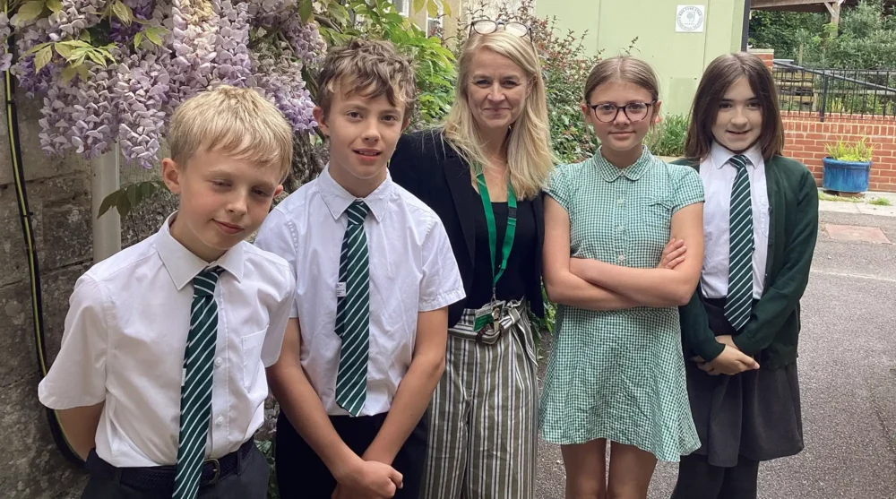 Polly Hale, centre, has taken on the role of head teacher
