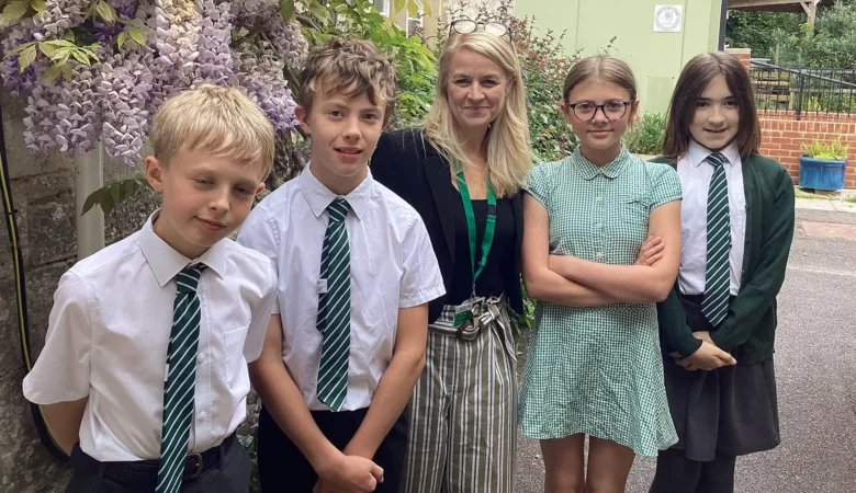 Polly Hale, centre, has taken on the role of head teacher