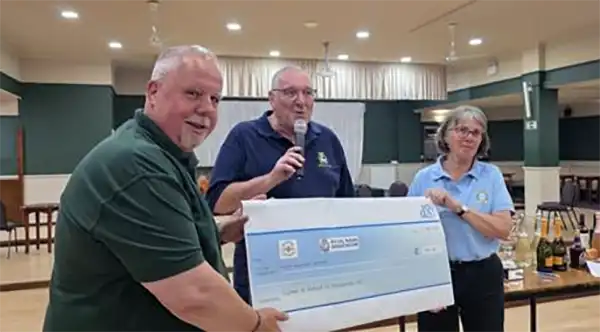 Richard Fagan of Drumgrange Ltd presents a £500 sponsorship cheque to Dorchester Royal Naval Association treasurer Pat Knight and chair Steve Armstrong